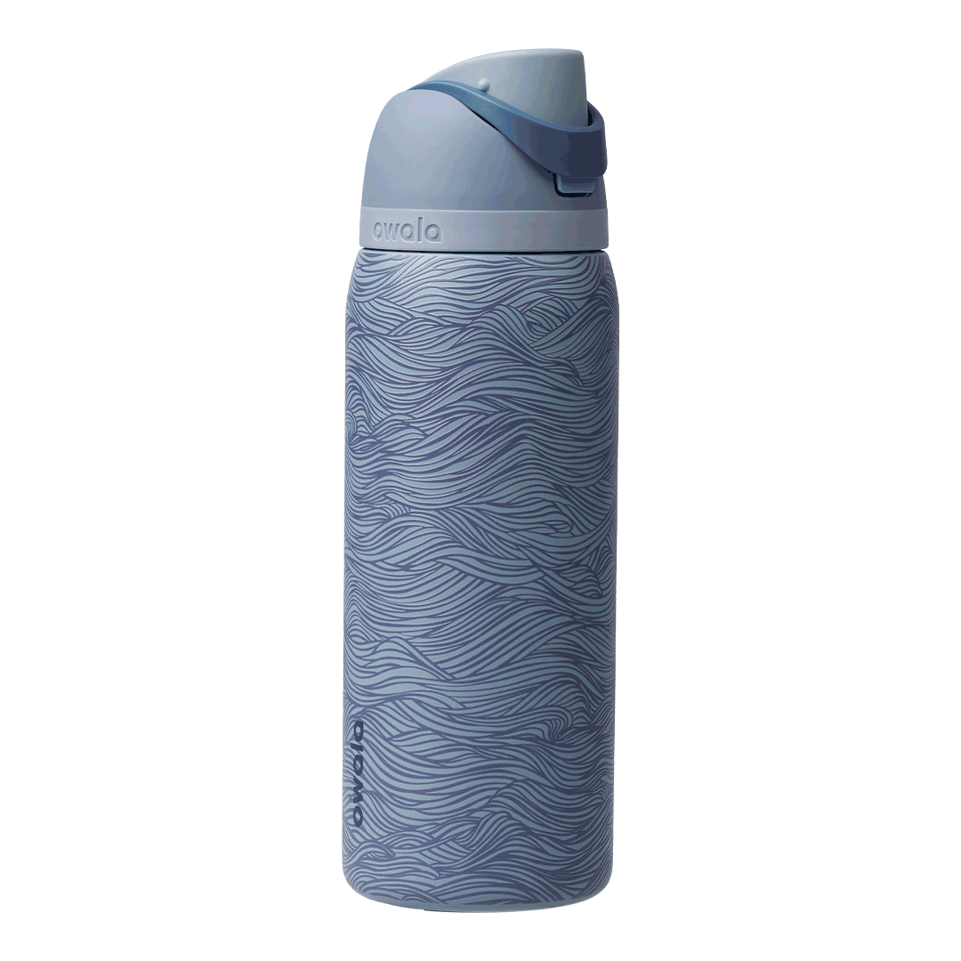 Owala FreeSip 32oz, slate blue body with embossed wave texture, lighter blue-gray lid with darker blue carry loop raised